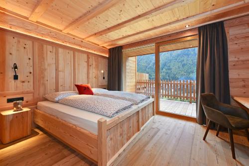 Postel nebo postele na pokoji v ubytování Chalet Leitner