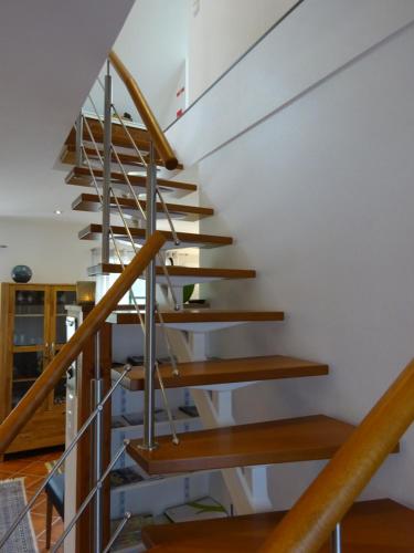 a set of wooden stairs in a building at Haus Geni in Nettetal