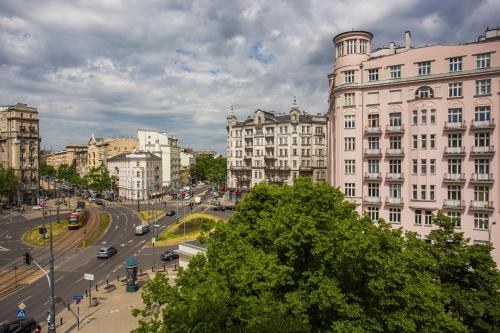 a view of a city with buildings and a street at Planet Hostel in Warsaw