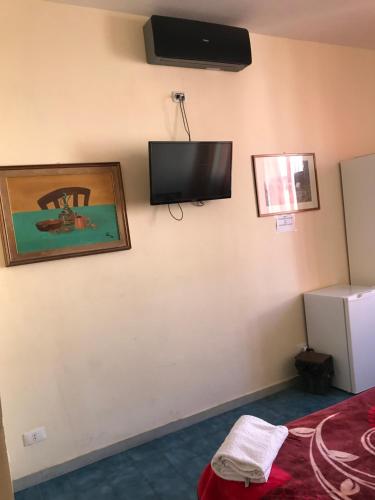 TV a/nebo společenská místnost v ubytování B&B Cappellini s.n.c.