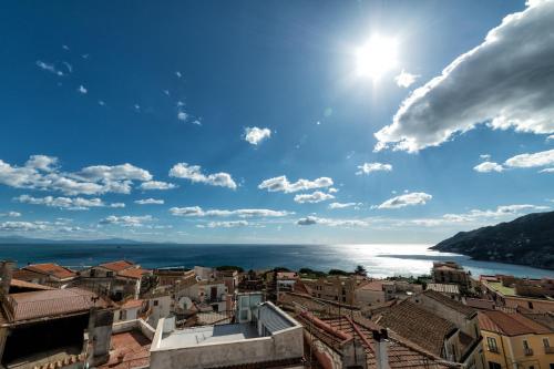 a view of a city and the ocean with buildings at B&B La Chiave in Vietri sul Mare