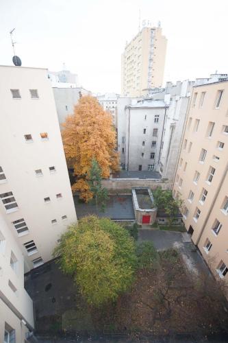 an aerial view of a city with tall buildings at Planet Hostel in Warsaw