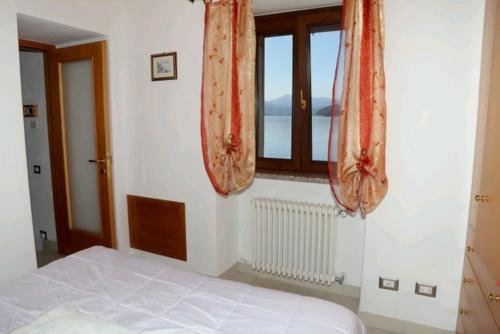 Postel nebo postele na pokoji v ubytování Casa Riva