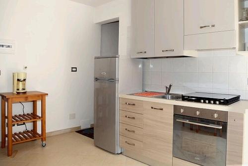 Kuchyň nebo kuchyňský kout v ubytování Casa Riva