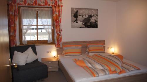 Llit o llits en una habitació de Apart Höferauer Hof