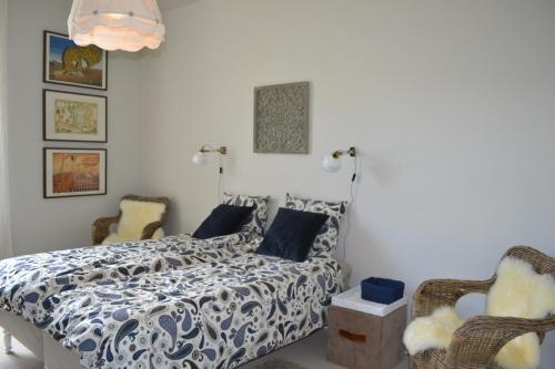 Ένα ή περισσότερα κρεβάτια σε δωμάτιο στο Appartement Passe Partout