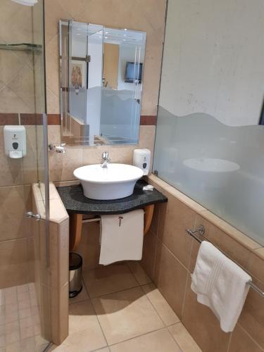 Koupelna v ubytování Europrime Hotel