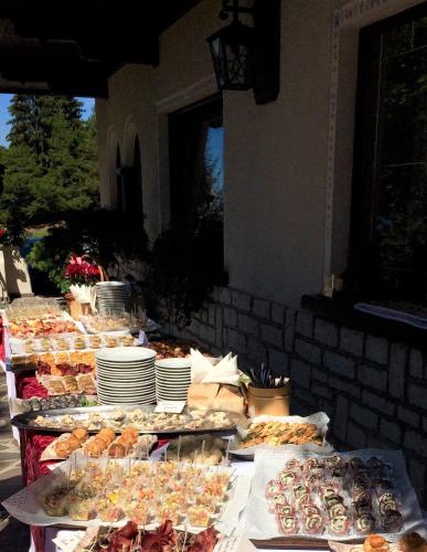 a buffet line with many different types of food at Hotel Villa Wilma in Folgaria