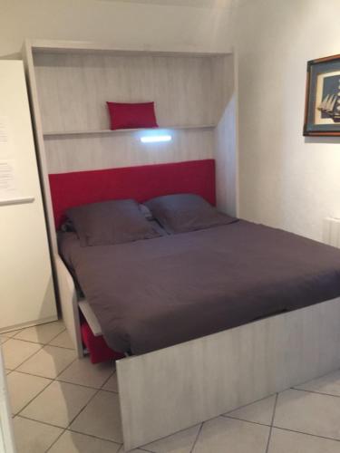 Ένα ή περισσότερα κρεβάτια σε δωμάτιο στο Residence Acapulco