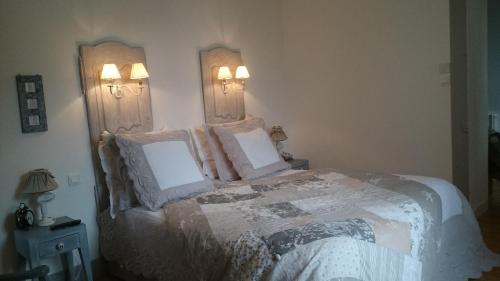 Postel nebo postele na pokoji v ubytování Château Bily B&B Hôtel