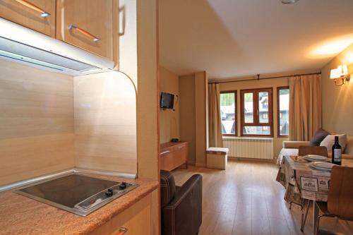 Kuchyň nebo kuchyňský kout v ubytování Hotel-Aparthotel El Reyno