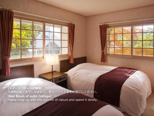 Katil atau katil-katil dalam bilik di Resort Villa Takayama
