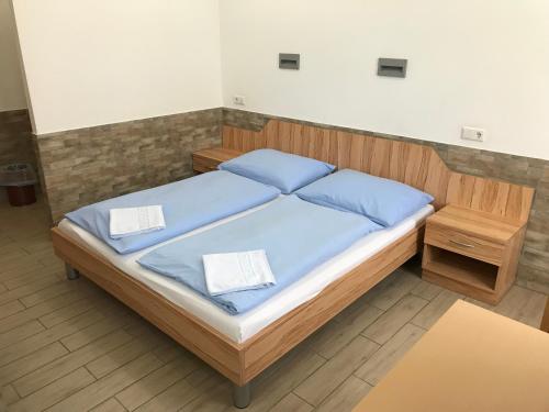 Ένα ή περισσότερα κρεβάτια σε δωμάτιο στο Hotel Pribitzer