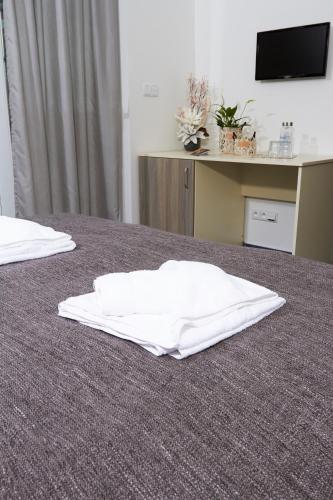 APARTMÁNY RYBNÍČEKにあるベッド