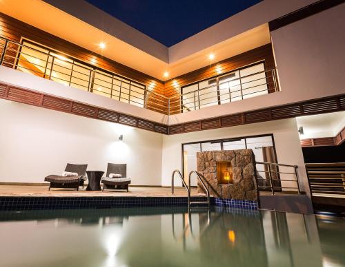 a swimming pool in a house at Sargas Villa, Saint Lucia in Colombette