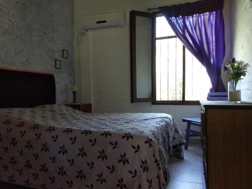 Una cama o camas en una habitación de Cabanas El Paramo