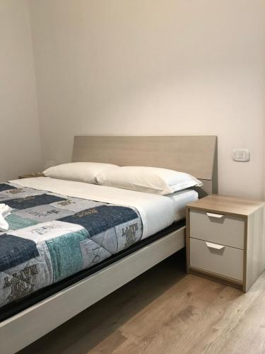En eller flere senge i et værelse på Loreto Elite Milano