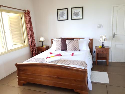 A bed or beds in a room at Summer Self Catering