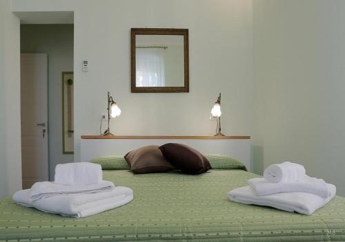 Een bed of bedden in een kamer bij Colors of Cinque Terre - Guest House