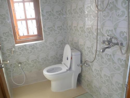 Koupelna v ubytování SUBI Home Stay