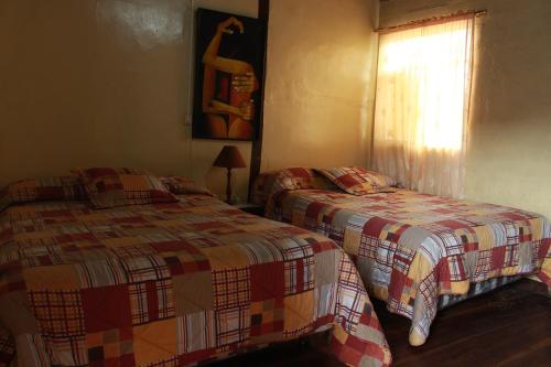 Cama o camas de una habitación en Montano Camping & Hostel