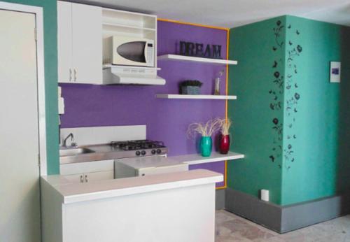 Η κουζίνα ή μικρή κουζίνα στο Satya Suites & Portal San Angel Flats