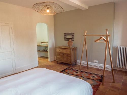 Postel nebo postele na pokoji v ubytování La Cour Verte