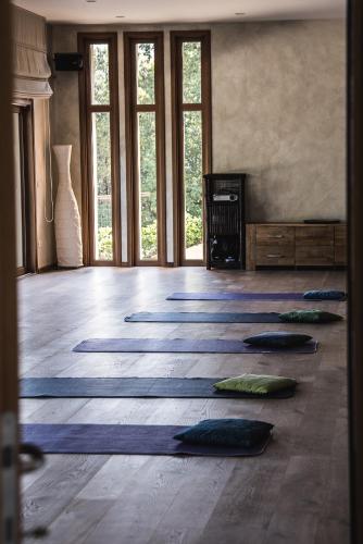 a room with blue mats on the floor at Sasseta Alta in Scansano