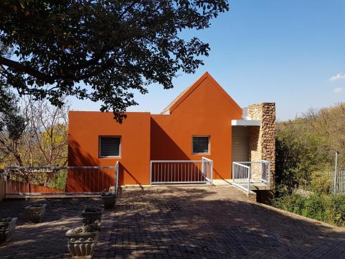 a house with an orange at Orangerie Guest House in Johannesburg
