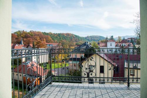 a balcony with a view of a city at Pension VILLA KLEINE WARTBURG in Eisenach