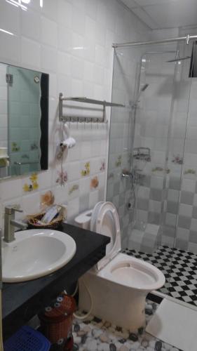 Salle de bains dans l'établissement Friendly Home Hotel