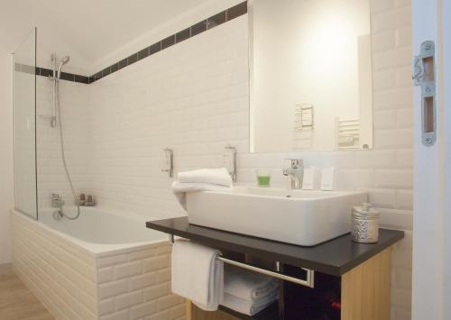 Koupelna v ubytování Hotel Balea