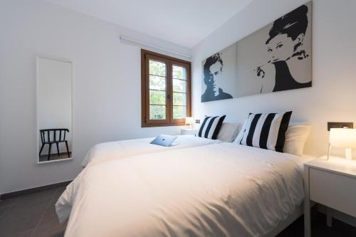 A bed or beds in a room at Loft Gran Canaria