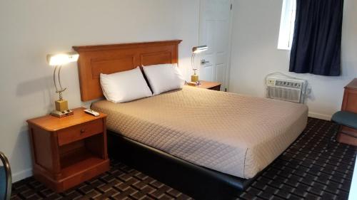 Ένα ή περισσότερα κρεβάτια σε δωμάτιο στο Budget Inn Breezewood
