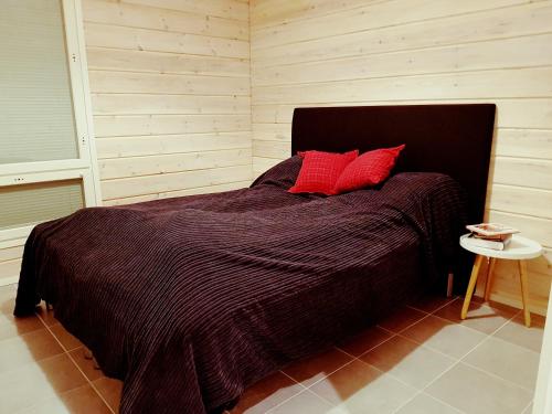 Postel nebo postele na pokoji v ubytování Laplandbike Apartment Arctic Circle