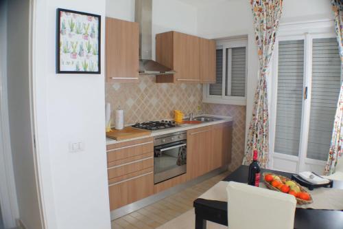 A kitchen or kitchenette at Vatican In The Moonlight Apartment