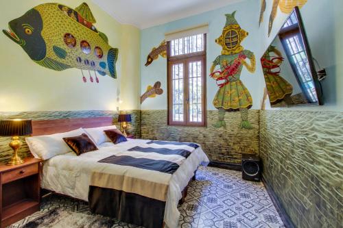 Postel nebo postele na pokoji v ubytování Casa Puente Hotel Boutique