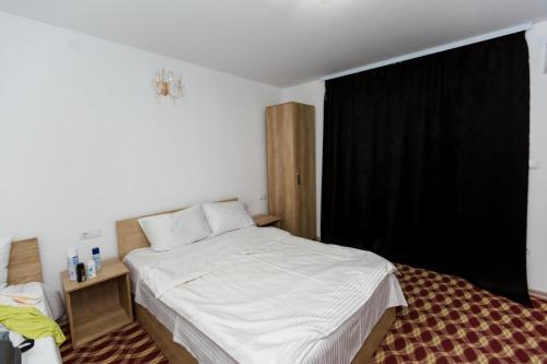 Ένα ή περισσότερα κρεβάτια σε δωμάτιο στο Juliana Platinum Brad
