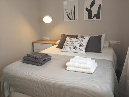Ein Bett oder Betten in einem Zimmer der Unterkunft Unique Apartments