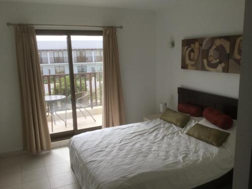 A bed or beds in a room at 3 bedroom/ 3 bathroom villa, Sal, Cape Verde