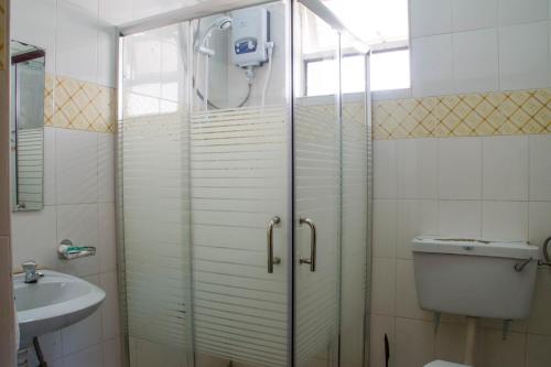 Ванна кімната в Pelikan Hotel
