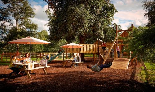 a group of people sitting at a playground at Newpark Hotel in Kilkenny