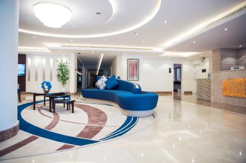 Lobbyen eller receptionen på Motiara Hotel - Al Murouj
