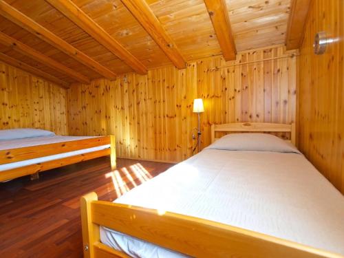 Postel nebo postele na pokoji v ubytování Apartment Mitar 1271