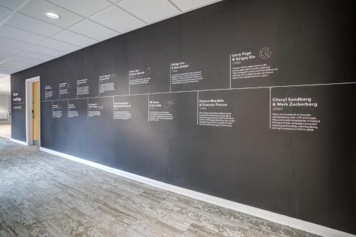 a black wall with a bunch of words on it at Warwick Conferences - Radcliffe in Coventry