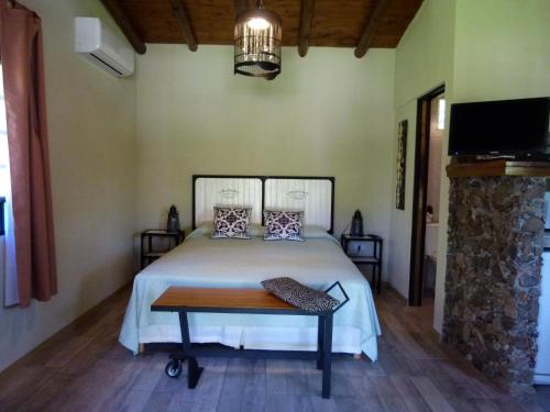 A bed or beds in a room at Guidai Bilu