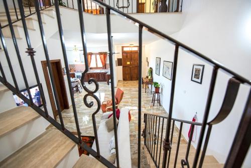 a staircase in a house with a snowboard at South Olives in Żejtun