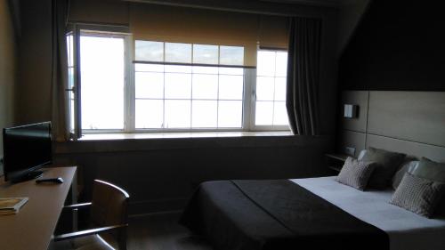Hotel Igeretxeにあるテレビまたはエンターテインメントセンター