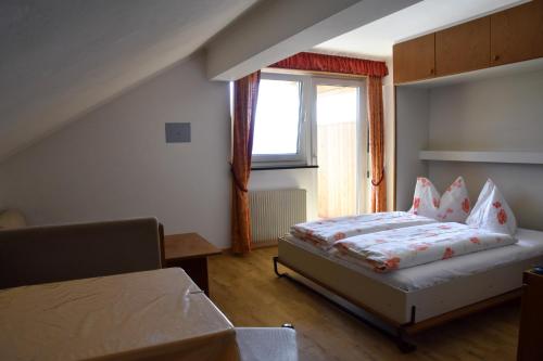 Postel nebo postele na pokoji v ubytování Residence Terentis