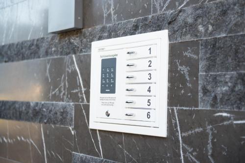 a control panel on the side of a brick wall at Haus Christine - SUMMERCARD INCLUDED in Zell am See